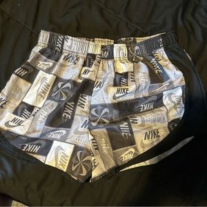Medium Nike running shorts, printied material.